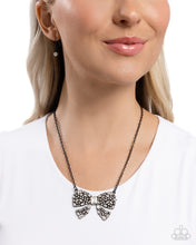 Load image into Gallery viewer, Paparazzi - Bewitching Bow - Black
